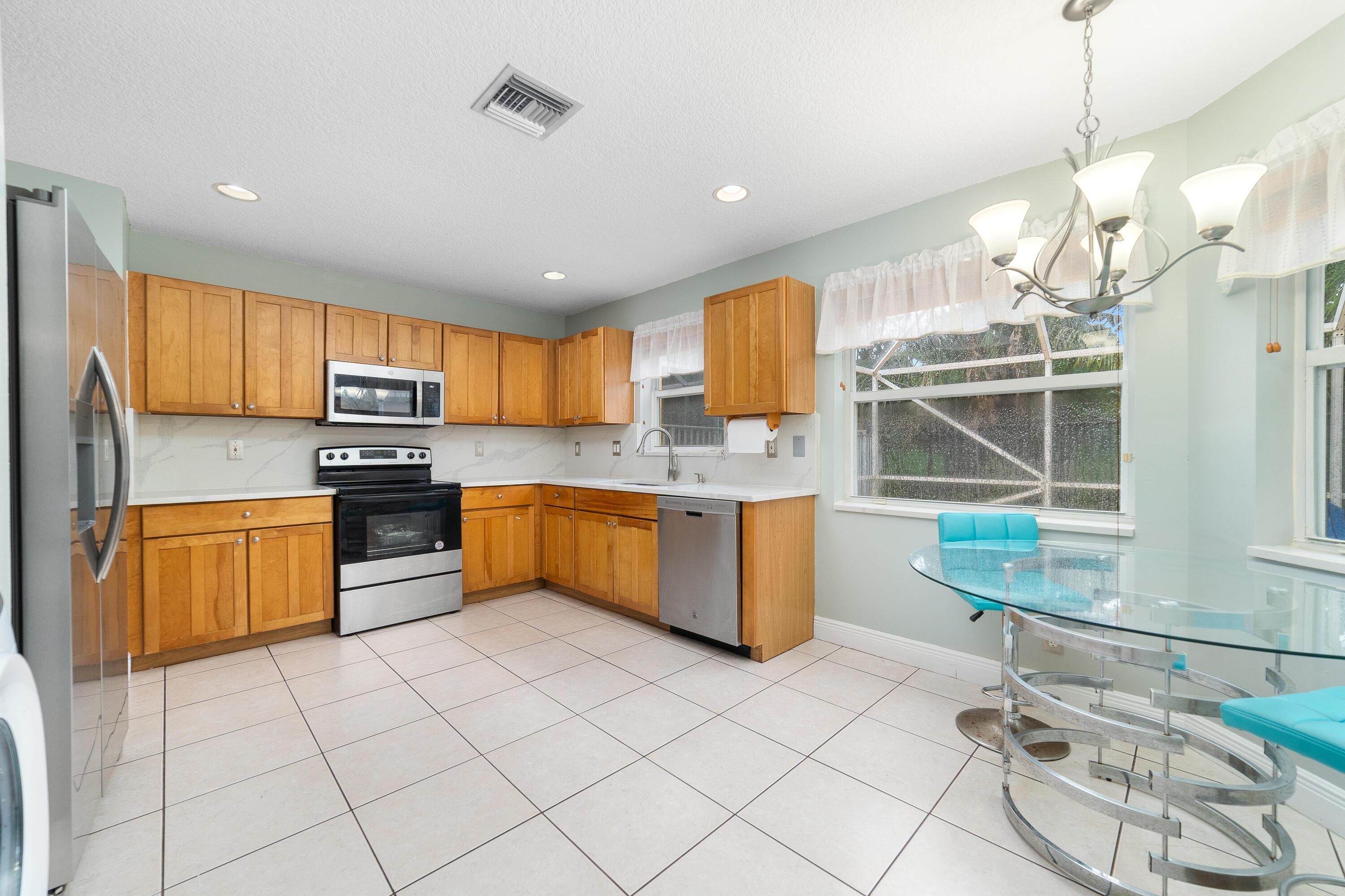 3943 Crescent Creek Drive, Coconut Creek, FL 33073 - Photo 5