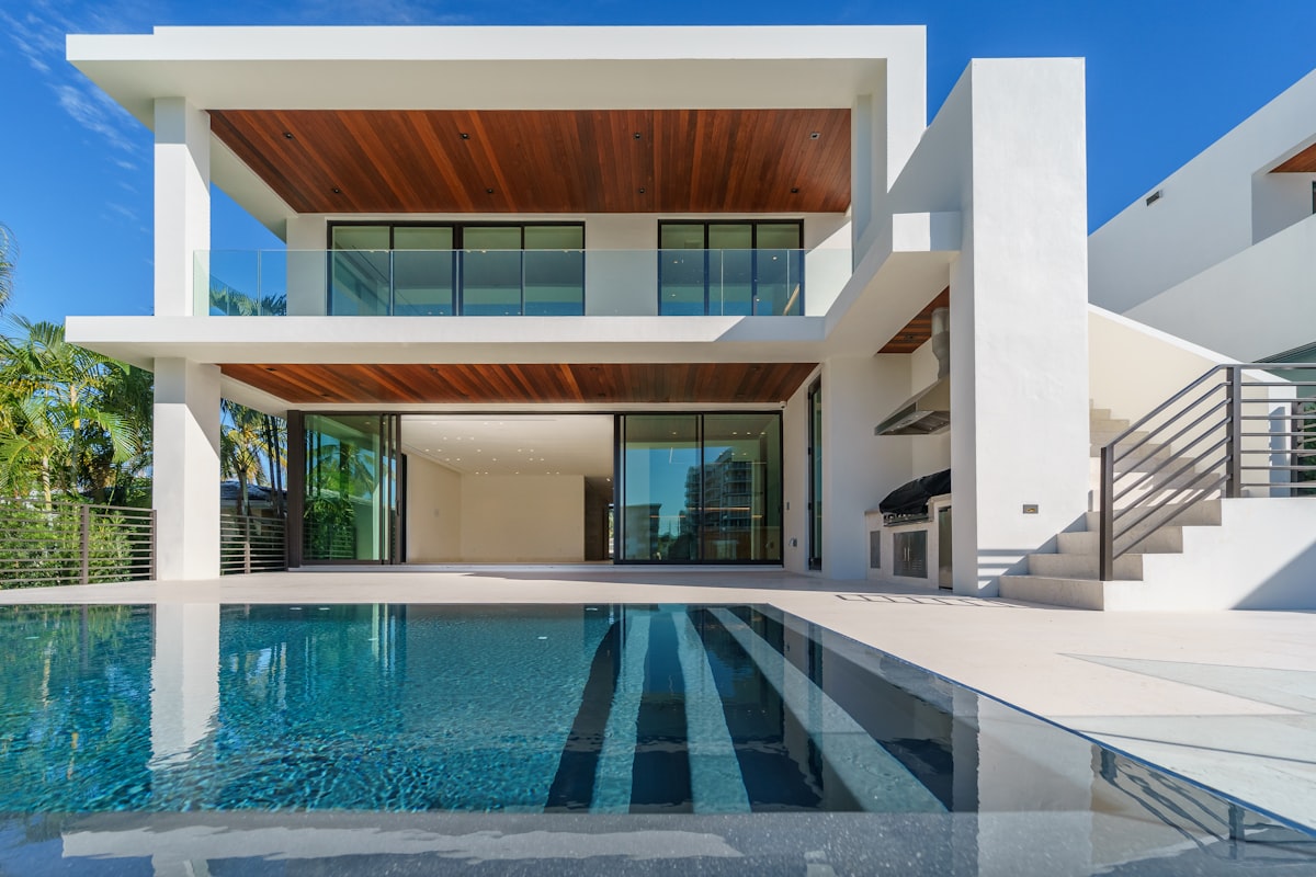 Modern luxury home with pool showcasing selling potential